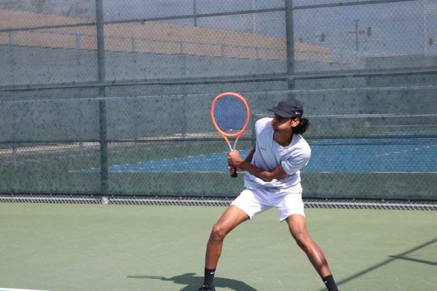 Co-captain and senior Rishi Vridhachalam exhales after landing a skillful backhand swing. Boys’ tennis went on to defeat Northwood High 12-8 during its April 18 home match at the tennis courts. The team’s current league standings are 9-5.