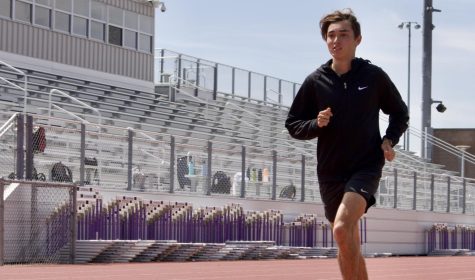Sophomore Mateo Allen-Aguirre gets ready for a speed workout by running 50 meter strides and doing drills to warm up his body. “My aspiration is mainly to see how hard I can push myself both mentally and physically to attain a level of commitment that is uncommon,” Allen-Aguirre said.