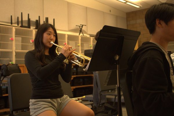 Senior Amber Lea practices her trumpet in the music room during office hours. In the Fall Instrumental Concert, Lea performed a trumpet solo that won praise from her peers and mentors. “Every time we were just blown away because the amount of projection that she had, the amount of confidence and just her tone, it just felt so mature for someone that only played the instrument for that long,” Nguyen said.  