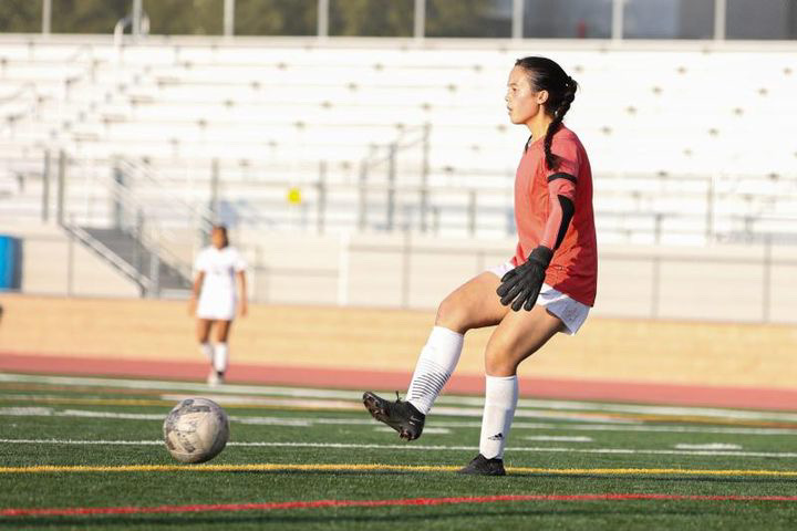 Goalie and freshman Chantal Alexander kicks the ball back into the playing field after Northwood High’s soccer team tries to score a goal. “She is a little more aggressive, a little bit more dynamic. Every game she has grown, so she has a bright future at Portola,” head girls soccer coach Joshua Stringer said.