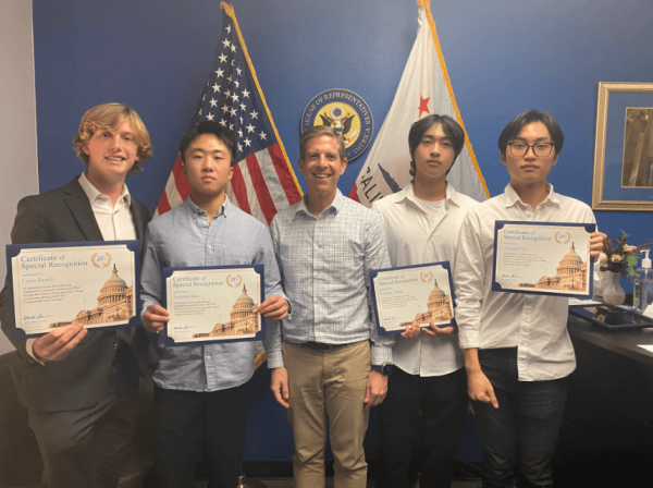 U.S. House of Representatives member Mike Levin (CA-49) awards seniors Zonglin Zhang and Terry You (rightmost) for their app, Ember, which aims to help youth feel more open in conversing about mental health. Although Ember is still being refined and not available on the app store yet, it can be viewed on the U.S. House of Representatives’ website, in the U.S. Capitol Building or requested for a demonstration, according to Zhang.