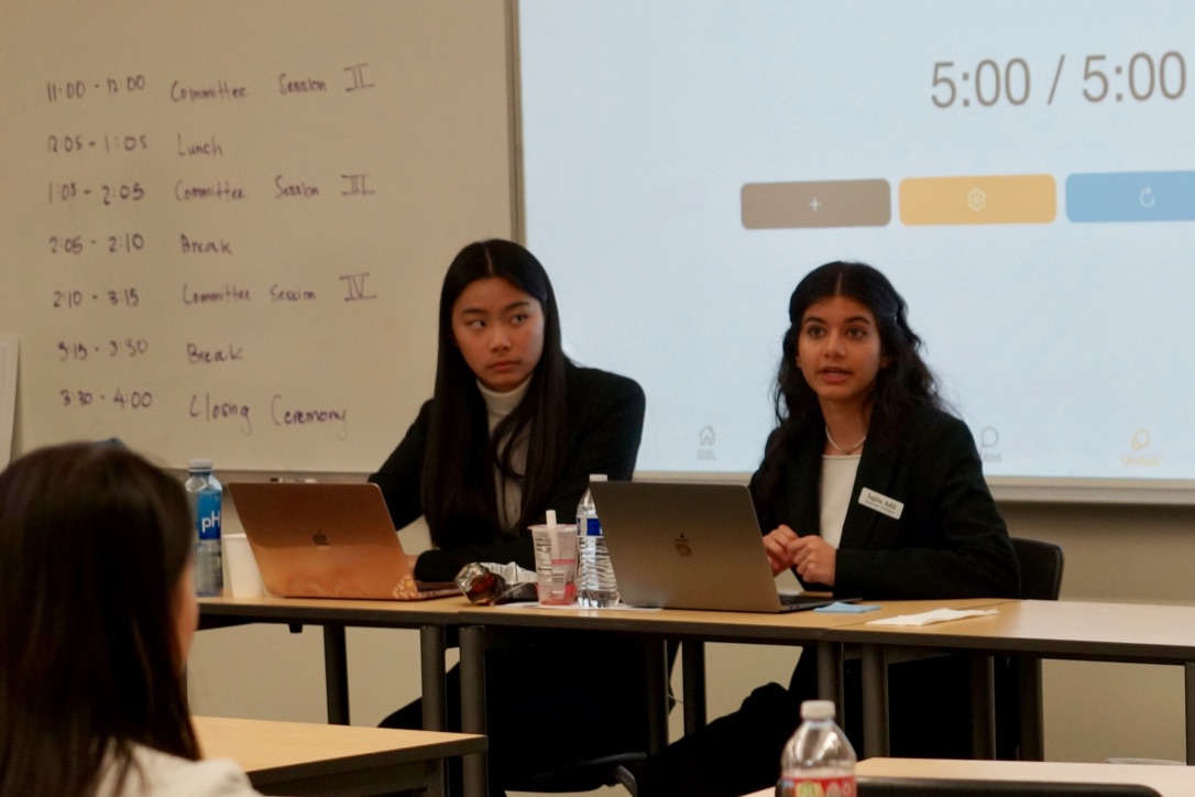 Novice UN Women vice chair and junior Jasmine Hou and UN Women head chair and senior Injia Adil lead their panel on the effects of domestic violence on mental health in the fourth committee session. As the host school, all chair positions are filled by Portola High MUN members.
