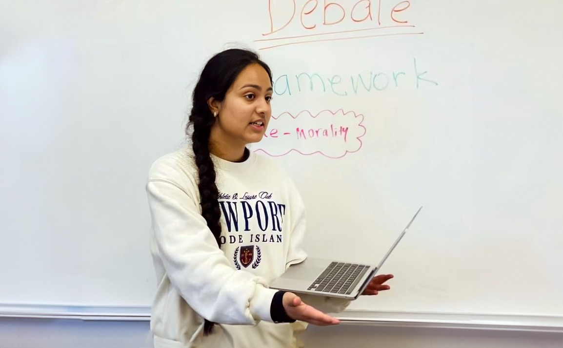 Sophomore Avnit Kaur works to strengthen her case with her speech and debate teammates. “The thing I love about the Lincoln-Douglas style is that we have to debate on both the affirmative side and the negation side of the resolution,” Kaur said. “It really helps you think on both sides rather than being fixated on one idea.”