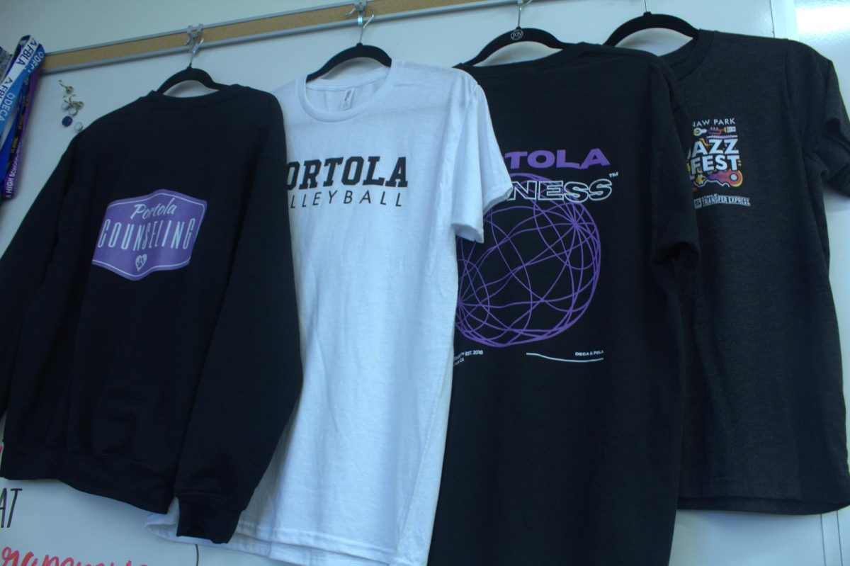 Portola Printing, the first ever Portola High business geared toward manufacturing shirts, has taken on orders for various organizations on campus. “Sometimes after school, we have a little party with about five to 10 students, heat pressing and folding and quality checking,” business teacher Katherine Dillon. “And then the next day during class whenever theyre ready, we count the orders and make sure we have all the right sizes, all the right numbers, make sure theyre all good and nothing’s peeling off and nothings broken, and then we just go deliver it to the classroom.”