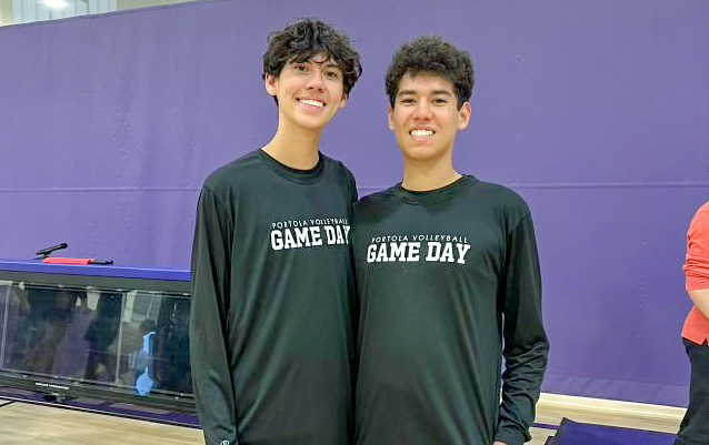 Boys’ volleyball sibling duo Jayce and Jett Fukuda smile before a varsity game last year. “I think that was really cool because having so many people there to watch me and my brother because were so lucky to be on the same team at that time,” junior Jayce Fukuda said. “That was really special and important to me.”