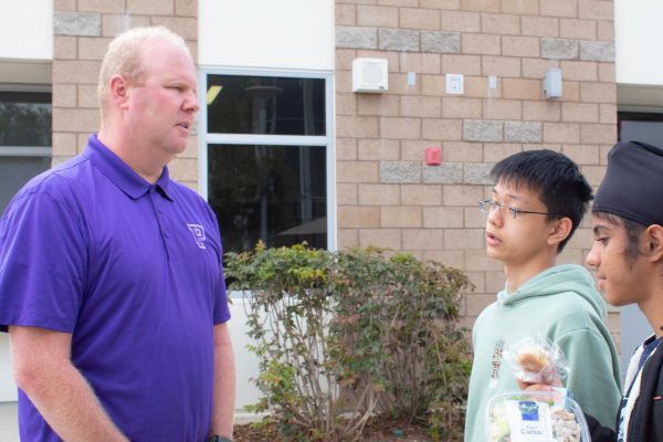 Assistant Principal Brandon Emery discusses how the new school year is progressing with sophomore Tiran Ng and freshman Arshdeep Makar, an integral task that ensures smooth and productive days for the rapidly growing student population. “I think Portola is definitely striving to find its identity in the district,” Emery said. “Being the most populated school on campus in the district, it's emerging as a forefront — like a school that’s testing new ideas and serving as a model for new schools in the district,” Emery said.
