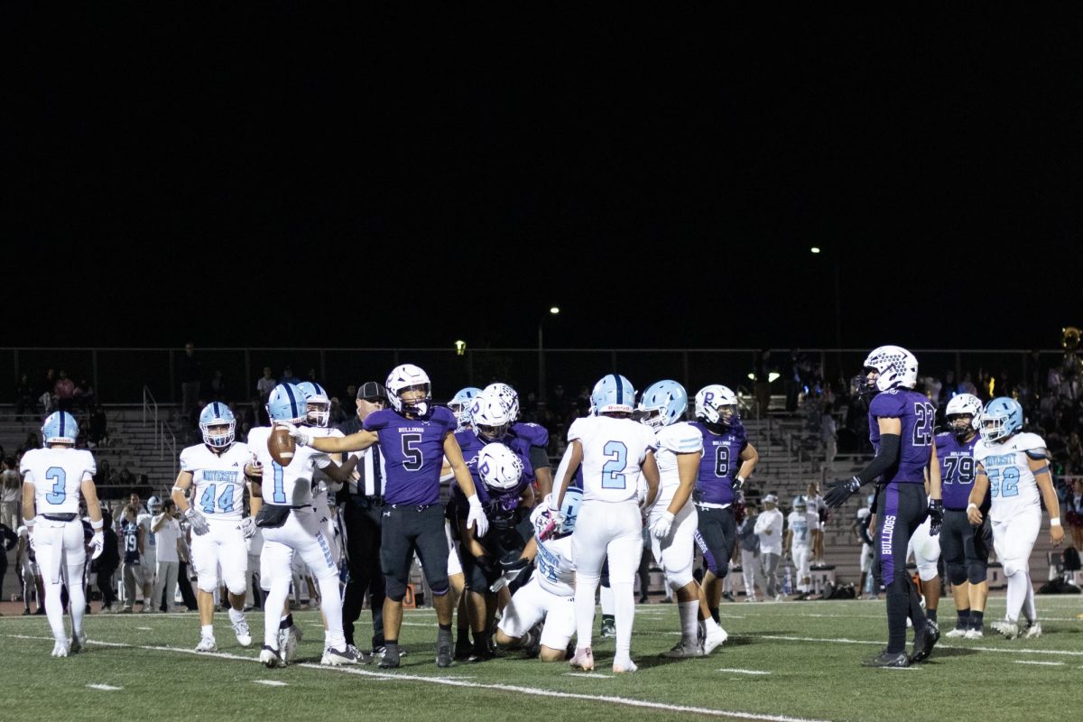 Running back and senior Diego Reyna celebrates after getting two consecutive first downs in the second quarter. “I was just so excited to have a big crowd out there and just everyone that I know backed in the stands,” captain, quarterback and senior Nash Luper said. “The hype around it was really cool. Coming out of it, it was just so much fun to have all those people there and to get a win in front of all of them.”