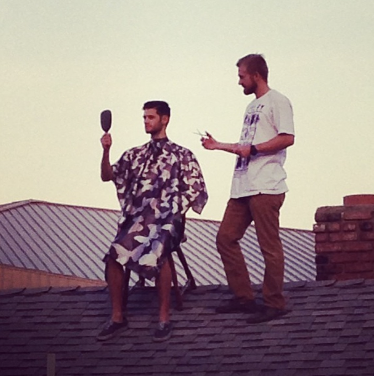 On a rooftop, English teacher and Head Track Coach Cale Kavanaugh’s creativity takes flight as he snips away at a new haircut. “I was in college cutting my best friend’s hair,” Kavanaugh said. “He thought it would be a great idea to cut his hair on our friend’s roof because it would make for an epic picture and help me promote my haircutting business.”