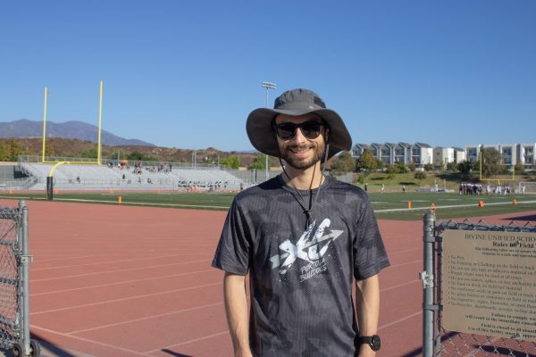 Math teacher and assistant coach Derek Zahn prepares to go on a long run with the cross country team to a nearby trail. “I just enjoy running, so I'm always looking forward to coming out running with them,” Zahn said. “All our cross country kids are great, so it makes it fun to be out here and help them do better. I'm just looking forward to them hopefully doing the best.”