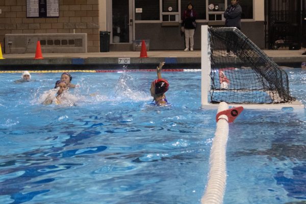 Goalie and senior Giselle Lu leaps up in the water and attempts to block a shot made by Long Beach Polytechnic High. Similarly, utility player Serena Wang managed to make several crucial saves. “We didn’t have as many members of defense as their offense, but we were able to stop the goals and shut them down because we helped each other by basically crashing onto the person with the ball and taking the ball,” Wang said.