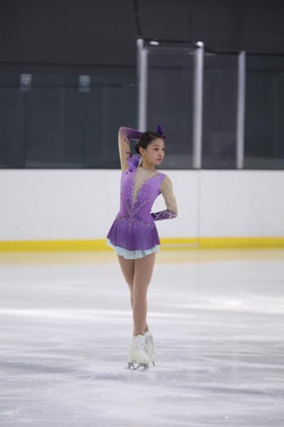 Freshman Teryn Kim strikes a pose at the end of her routine for the 2024 SoCal Invitational Final where she placed first. “I really like [skating] because of the feeling of flying in the air and the excitement when you do well after a competition,” Kim said. “Skating across the ice, and then a cold wind on your face; it’s just a free feeling.”