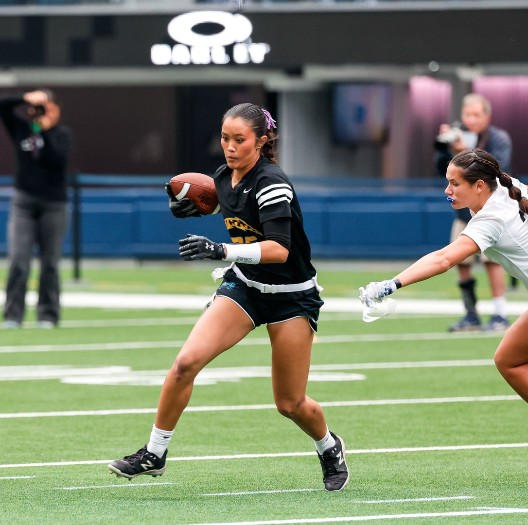 Senior Bianca Morrell catches a pass while playing offense during the LA Chargers Girls’ Flag All-Star game. “I was ecstatic—playing on the fields where the LA Rams get to play, and working with coaches who've had experience with flag football, and playing around with girls who like to compete and who want to win,” Morrell said.