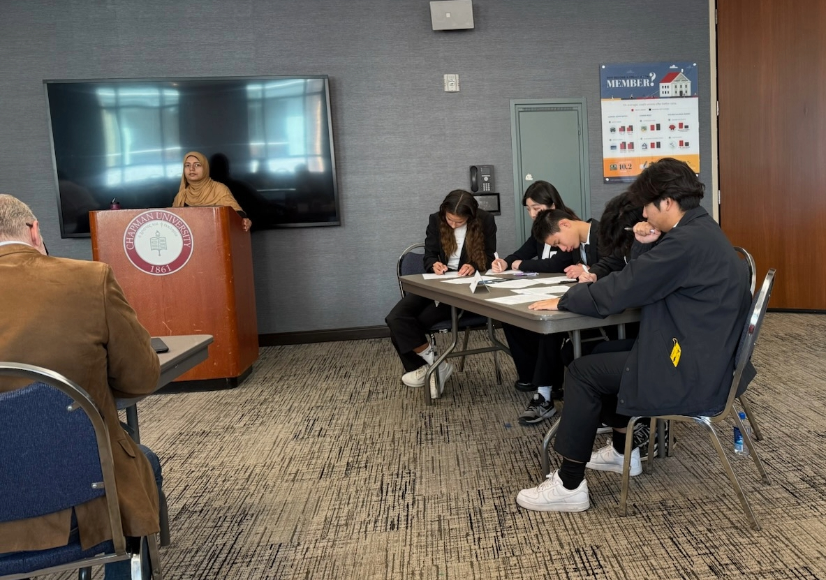 Members of the National Ethics Bowl Club compete at the Southern California Regional High School Ethics Bowl at Chapman University. “When we’re in competition season, meetings become a lot more structured and focused, though things still have a tendency to get a bit chaotic sometimes,” president and junior Moses An said. “It’s a collaborative process, and we put a lot of focus on teamwork.”