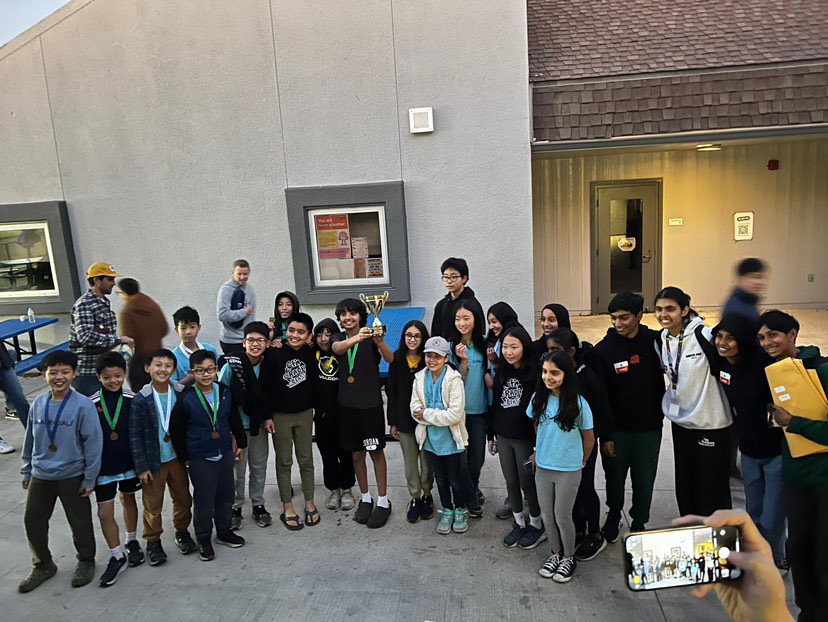 Woodbury Elementary Science Olympiad head coach and freshman Smriti Mishra poses with her Science Olympiad team after the Sierra Vista Invitational where the team placed fifth. “I was inspired by my sister who was a coach at Jeffrey Trail and at Woodbury as well,” Mishra said. “And then I became the coach at Woodbury, so I got inspired by looking up to my peers as well as looking at the older kids around me.”