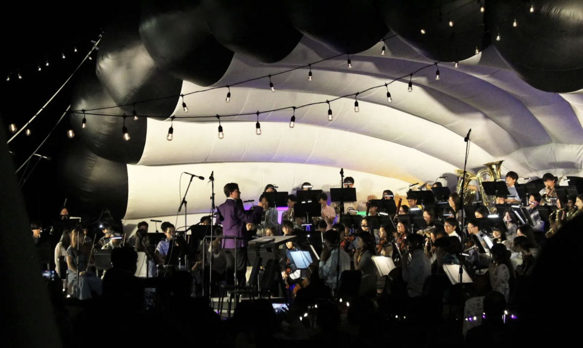 Instrumental Music Director Matthew Distante conducts the Wind Orchestra in a rendition of “At the Strongholds of En Gedi” by David Holsinger, an intense and cinematic traditional composition. During the teaching process, Distante said that he emphasizes three key philosophies when it comes to a successful performance: confidence, preparation and focus. “We teach that a lot, and I think that if students are checking all three of those boxes, that's an absolute success of a performance,” Distante said.