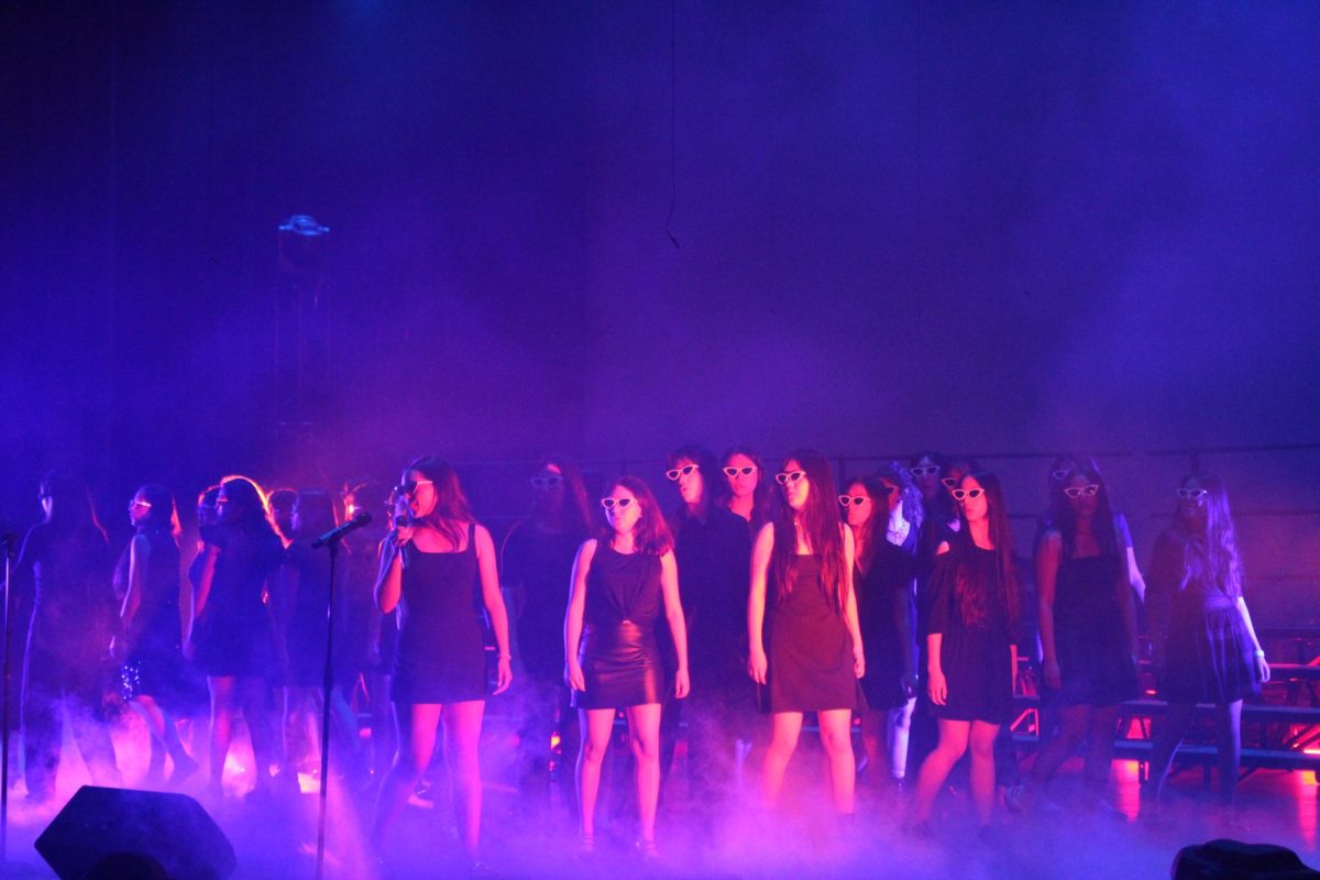 Canta Bella member and junior Bella Valencia performs a solo during the ensemble’s performance of “Stay” by Rihanna. “I always enjoyed watching the Treblemakers, the all guys group, because they always have really fun dances,” Portola Singers member and junior Jaskiran Singh said. “I also loved Bella Valencia's solo and Portobella song.”