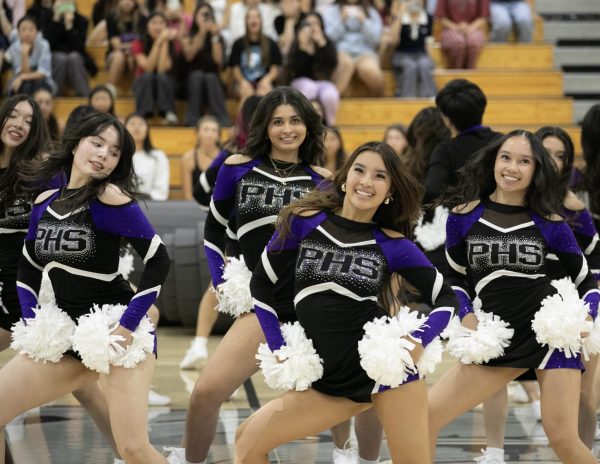 Dance Company captain and senior Zurie Tran dances to “Move to Miami” by Enrique Iglesias. For Tran, performing is just one part of what Dance Company does at school events. “As Dance Company, part of our job is to make sure that we're cheering for everybody,” Tran said. “We make sure other people know how spirited we are, so we can show we have that Portola pride.”