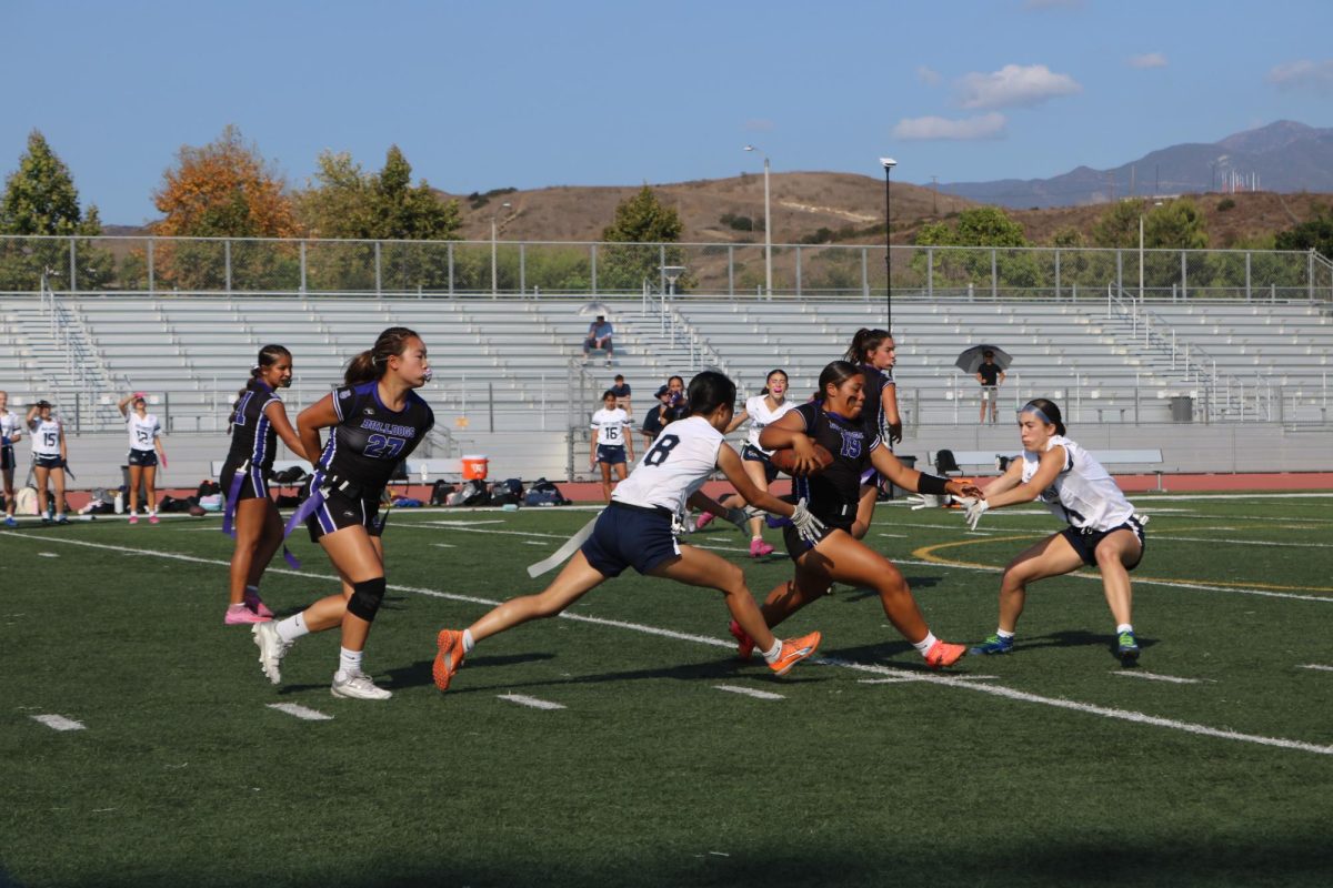 Quarterback and sophomore Aliyah Wimbley help the Bulldogs keep up a strong offensive position that helped offense and sophomore Joey Nesland score an extra point toward the end of the third quarter. “We knew it was going to be a big game, so we knew that we had to pull every flag, make minimal mistakes,” wide receiver and sophomore Joey Nesland said. “I think we did that.” 