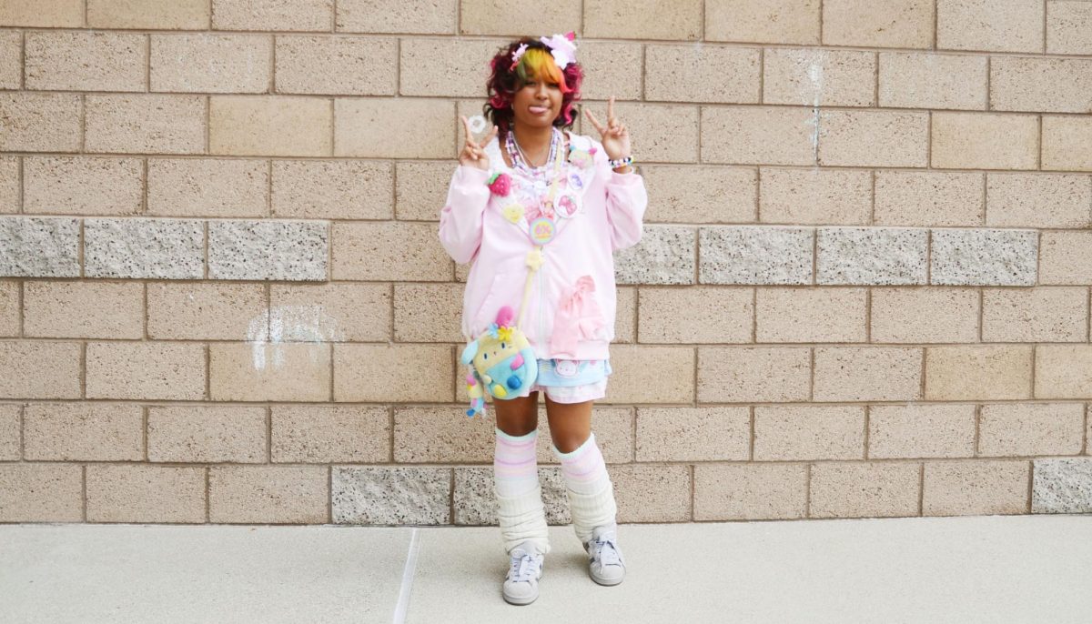 Junior Averie Mckinley poses in Decora-kei fashion. “My style is called Decora,” Mckinley said. “It’s when you decorate yourself [with] a bunch of accessories everywhere, so I could cover my whole head in clips, or put a bunch of bracelets and necklaces on. The whole thing is to be very over the top decorated.”