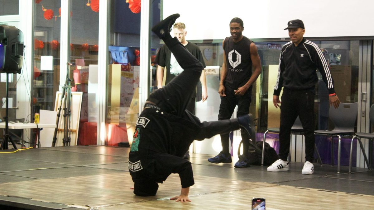 Dance LA Entertainment perform a hip-hop breakdance on stage as a part of their show displaying to attendees the four pillas of hip-hop culture that emerged in 1970s New York: graffiti, DJing, rapping and dancing.“I think this, these events are a great way to let people experience different communities and be aware of them — not in a pressuring way — but in a fun and entertaining way,” attendee and junior Jiwon Kim said.
