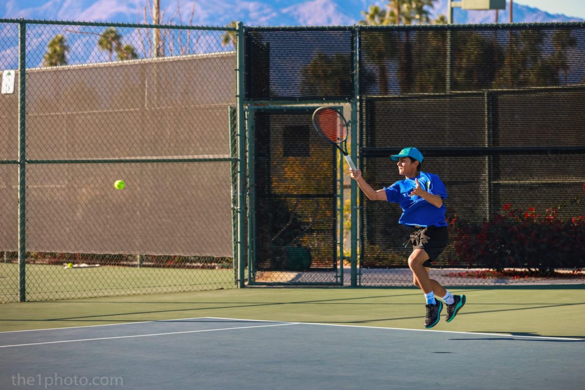 Jaxon Moore takes classes through the Irvine Virtual Academy while being a member of Portola High’s boys varsity tennis team. “I've known [Moore] since he was little,” boys head tennis coach Natasha Schottland said. “To see the growth in his tennis, his personality and in his character is really rewarding. I'm happy he chose a way where he can do online schooling, but still train and still play for the team.”