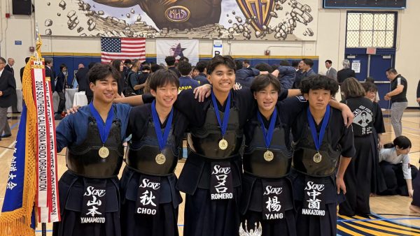 Sophomore Ethan Choo and his teammates celebrate their win at the All United States Kendo Federation Junior Nationals.